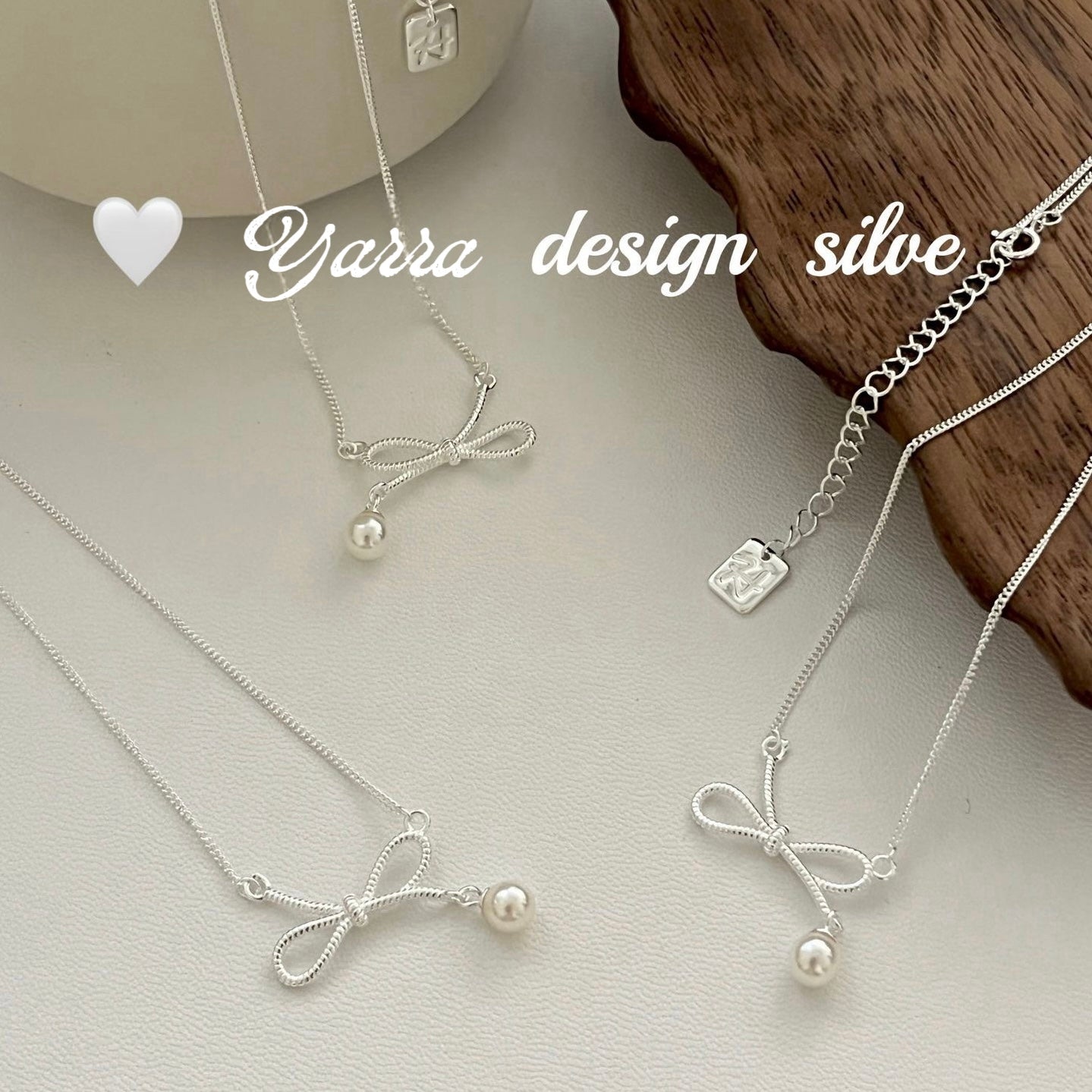 Twist Bow & Pearl Pendant Necklace