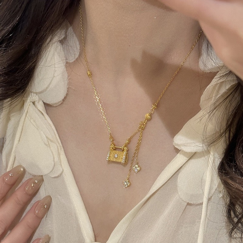 Gold Handbag Pendant Necklace with Diamond Accents