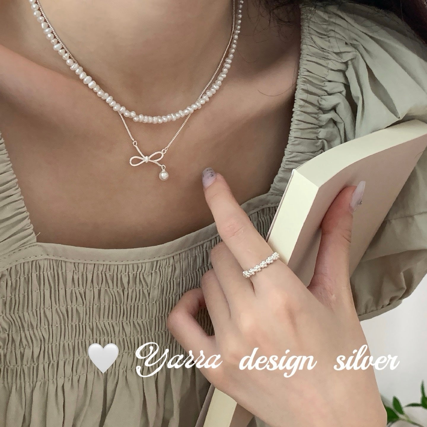 Twist Bow & Pearl Pendant Necklace