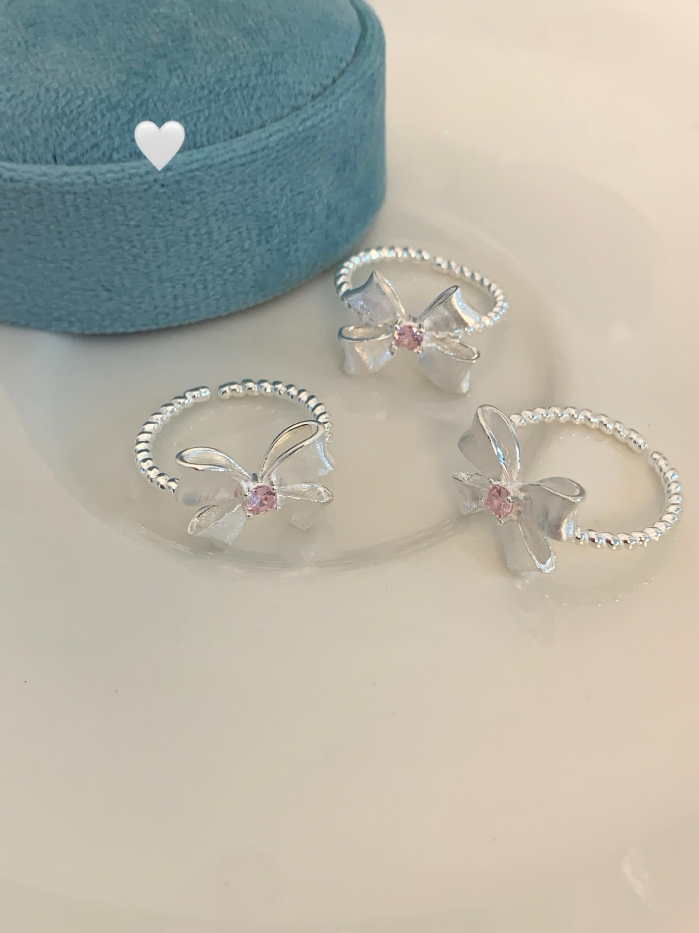 Bow Ring with Pink Zircon
