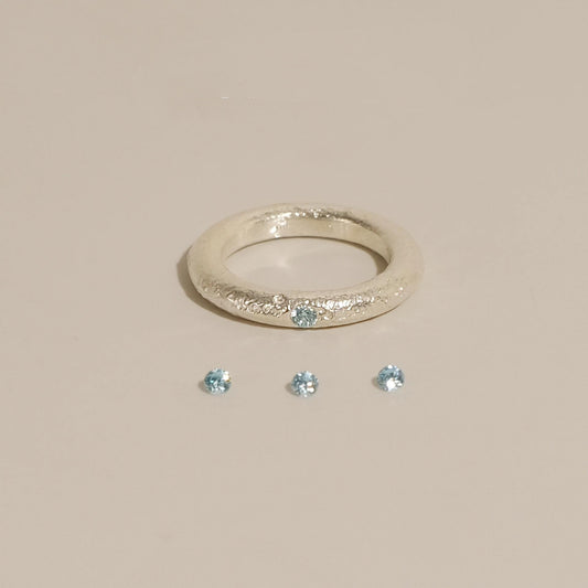 Ice Blue Accent Textured Silver Ring