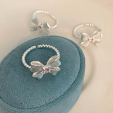 Bow Ring with Pink Zircon